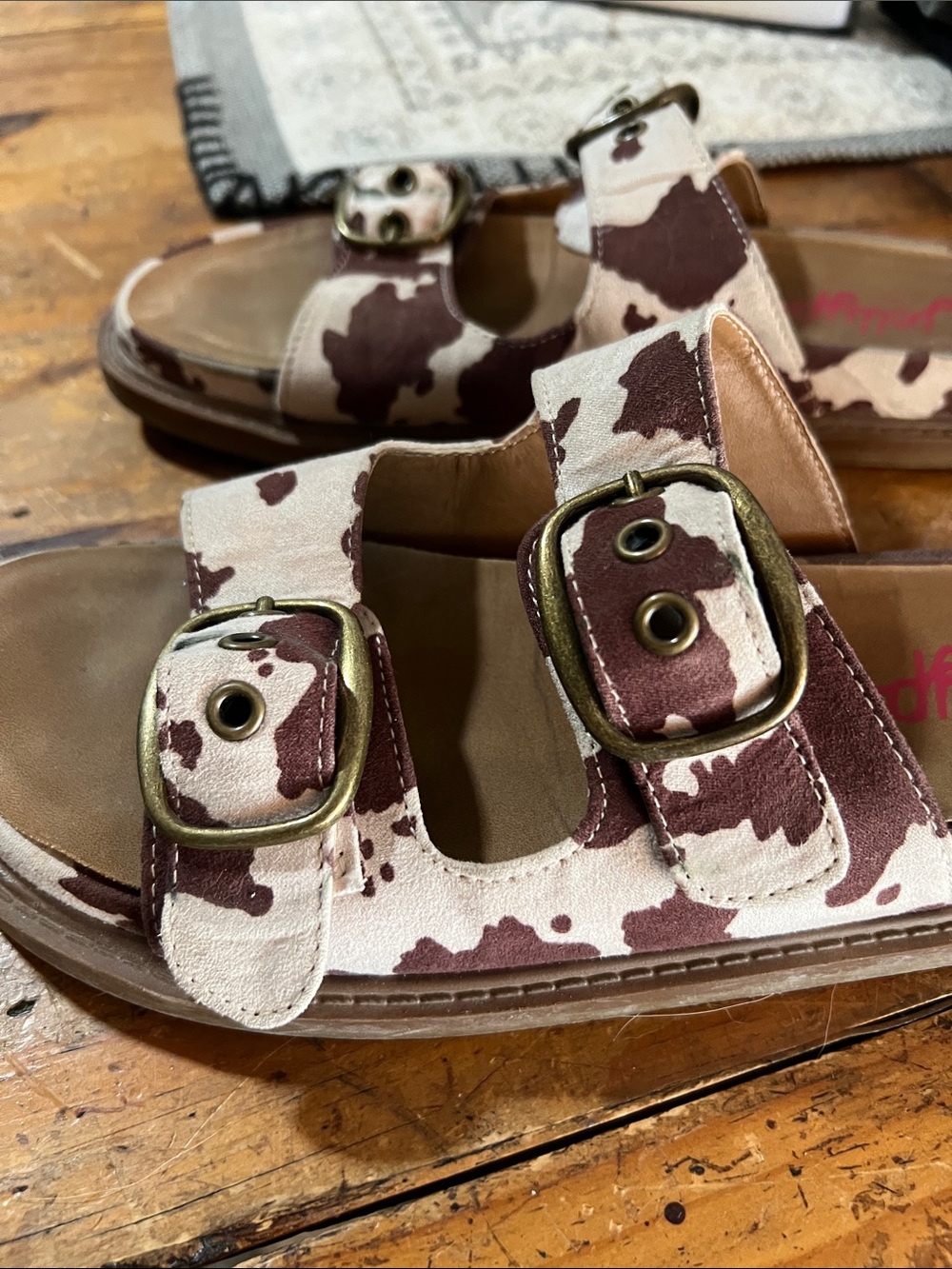 Jellypop Brown and Cream Cow Print Double Buckle Slide Sandals